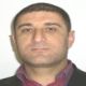 TUNCAY ER — Interpol Red Notice